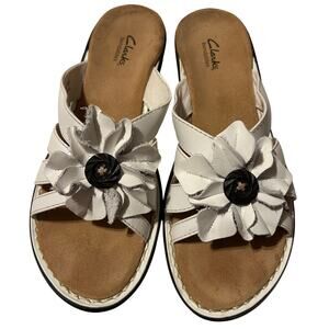 Women’s white leather Clarks flower sandals size 8.5